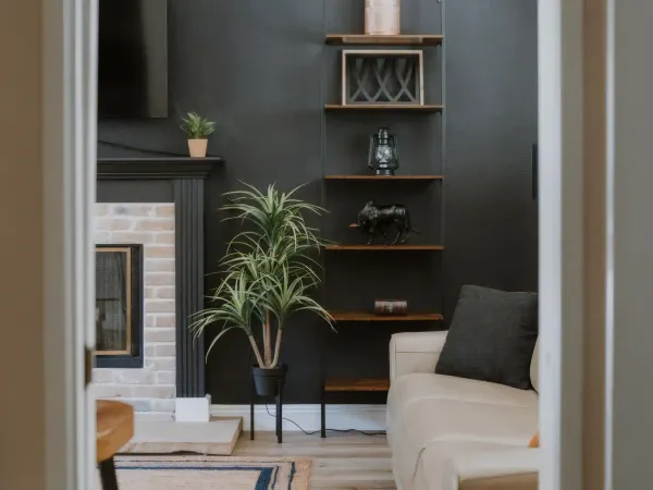 Cozy living room with leather seating at San Diego Trail Company's Airbnb ranch in Poway, CA